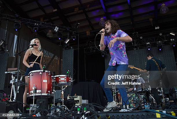 Youngblood Hawke singer Sam Martin and singer/percussionist Alice Katz perform in concert at the Uptown Amphitheatre on August 13, 2014 in Charlotte,...