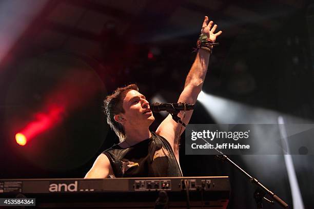 Walk the Moon singer/keyboardist Nicholas Petricca performs in concert at the Uptown Amphitheatre on August 13, 2014 in Charlotte, North Carolina.