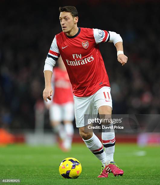 Mesut Ozil of Arsenal during the Premier League match between Arsenal and Hull City at Emirates Stadium on December 4, 2013 in London, England.