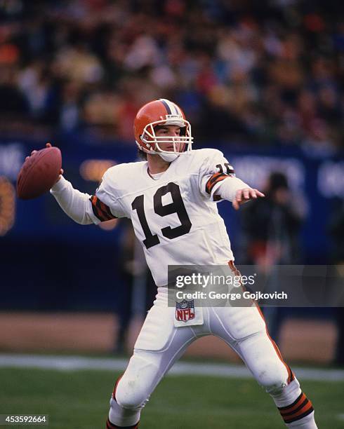 Quarterback Bernie Kosar of the Cleveland Browns passes during a National Football League game at Municipal Stadium circa 1985 in Cleveland, Ohio.