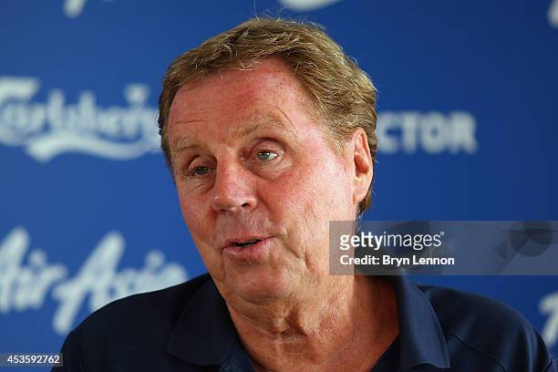 Queens Park Rangers Manager Harry Redknapp speaks to the press during a Queens Park Rangers Training Session and Press Conference on August 14, 2014...