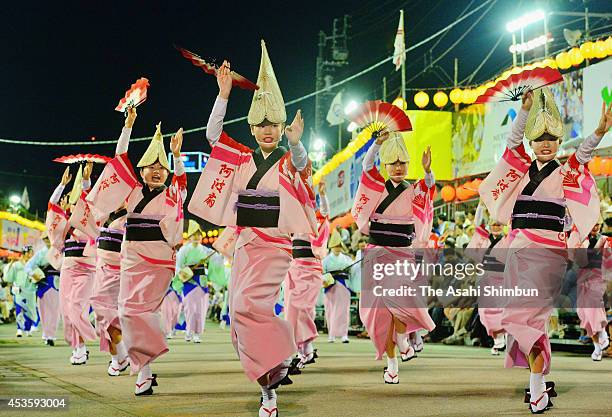 Japanese dressed in traditional costumes perform Awa-Odori dance during the annual 'Awa odori' or Awa Dance Festival on August 12, 2014 in Tokushima,...