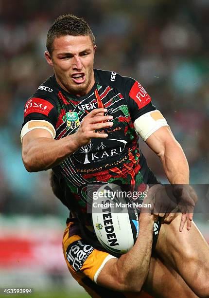 Sam Burgess of the Rabbitohs loses the ball in a tackle during the round 23 NRL match between the South Sydney Rabbitohs and the Brisbane Broncos at...