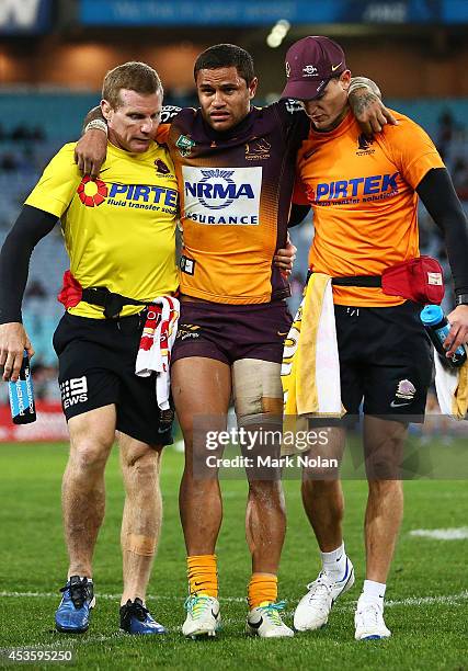 Josh Hoffman of the Broncos is taken from the field with an injury during the round 23 NRL match between the South Sydney Rabbitohs and the Brisbane...