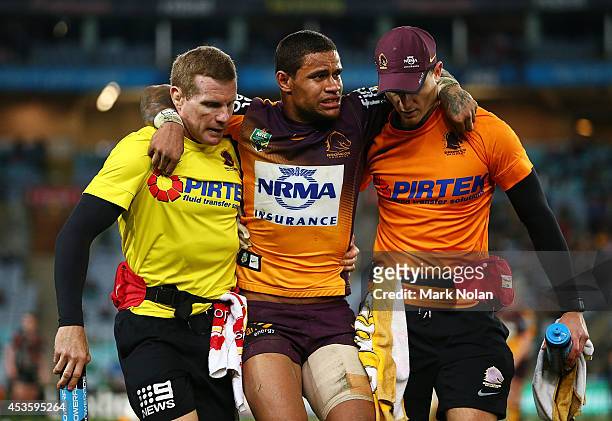 Josh Hoffman of the Broncos is taken from the field with an injury during the round 23 NRL match between the South Sydney Rabbitohs and the Brisbane...
