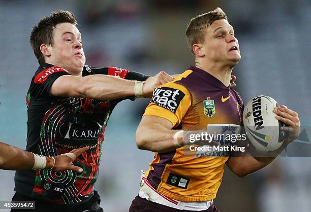 Dale Copley of the Broncos makes a break during the round 23 NRL match between the South Sydney Rabbitohs and the Brisbane Broncos at ANZ Stadium on...