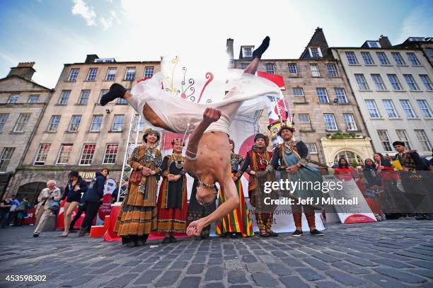 Tjimurdance theatre perform in the Edinburgh Festival Fringe on the Royal Mile on August 14, 2014 in Edinburgh, Scotland. The largest performing arts...