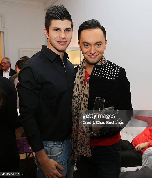 Tobias Voss and Julian Steckel attend a photo exhibition of Tom Lemke at the Center of Aesthetics on December 4, 2013 in Berlin, Germany.