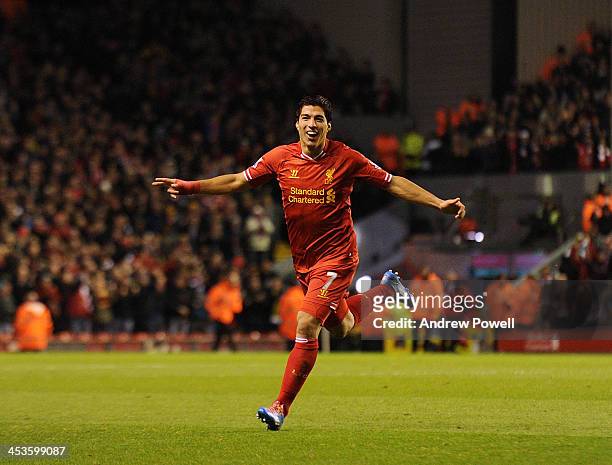 Luis Suarez of Liverpool celebrates after scoring the fourth during the Barclays Premier League match between Liverpool and Norwich City at Anfield...