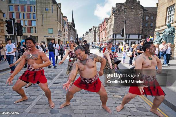 EDINBURGH, SCOTLAND Te Matatini Kapa Haka Aotearoa perform the Haka at the Edinburgh Festival Fringe on the Royal Mile on August 14, 2014 in...