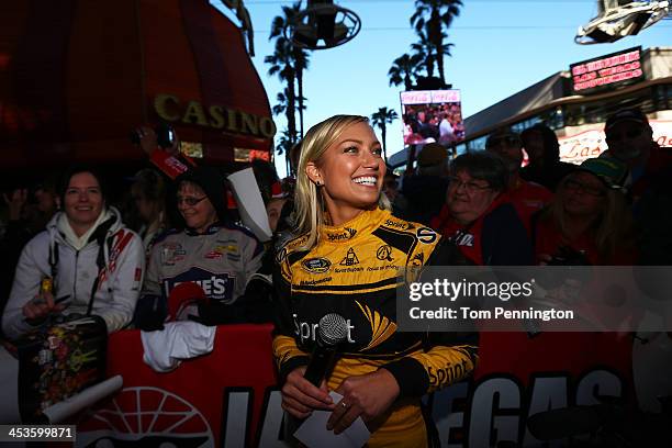 Miss Sprint Cup Brooke Werner attends a fanfest hosted by Las Vegas Motor Speedway on the Third Street Stage at the Fremont Street Experience on...