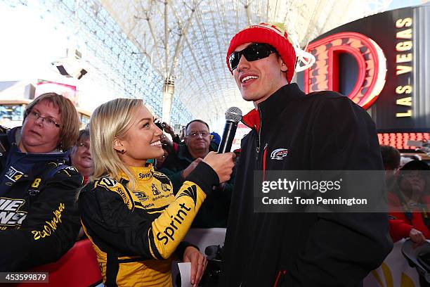 Miss Sprint Cup Brooke Werner interviews Sprint Cup Series driver Joey Logano at a fanfest hosted by Las Vegas Motor Speedway on the Third Street...