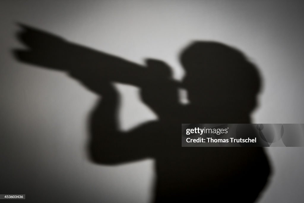 Silhouette Of A Photographer