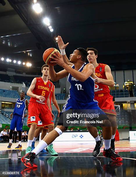 Amine Noua of France in action during the FIBA U17 World Championships Quarter-Final match between France and Spain at the Hamdan Sports Complex on...