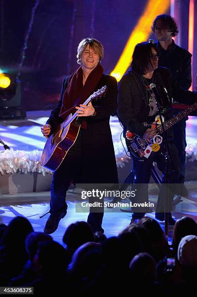 Robby Takac and John Rzeznik of the Goo Goo Dolls perform during 81st Annual Rockefeller Center Christmas Tree Lighting Ceremony at Rockefeller...