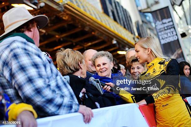 Miss Sprint Cup Brooke Werner attends a fanfest hosted by Las Vegas Motor Speedway on the Third Street Stage at the Fremont Street Experience on...