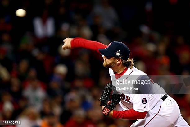 Ryan Dempster of the Boston Red Sox pitches in the ninth inning against the St. Louis Cardinals during Game One of the 2013 World Series at Fenway...