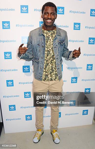 Wretch 32 attends the launch of the new adidas Originals London Flagship store at 15 Foubert's Place on August 14, 2014 in London, England.