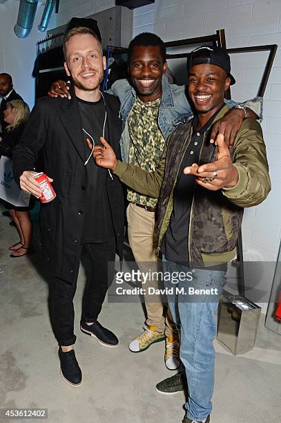 Mr Hudson, Wretch 32 and George The Poet attend the launch of the new adidas Originals London Flagship store at 15 Foubert's Place on August 14, 2014...