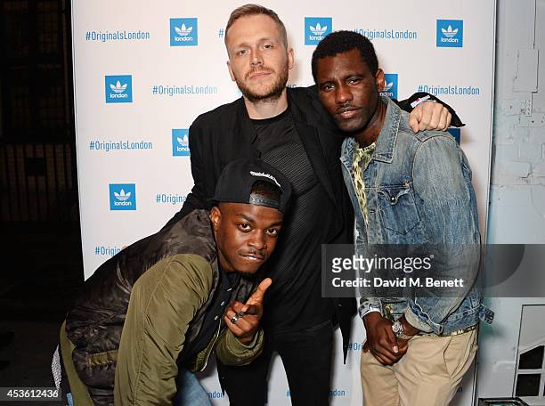 George The Poet, Mr Hudson and Wretch 32 attend the launch of the new adidas Originals London Flagship store at 15 Foubert's Place on August 14, 2014...