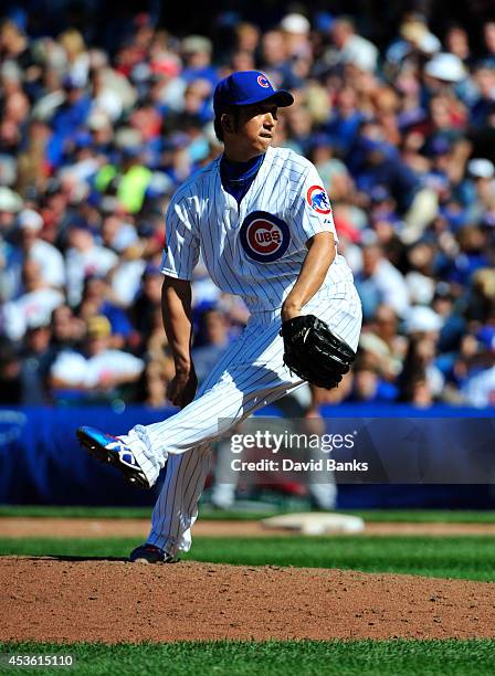 Kyuji Fujikawa of the Chicago Cubs pitches against the Milwaukee Brewers during the eighth inning on August 14, 2014 at Wrigley Field in Chicago,...