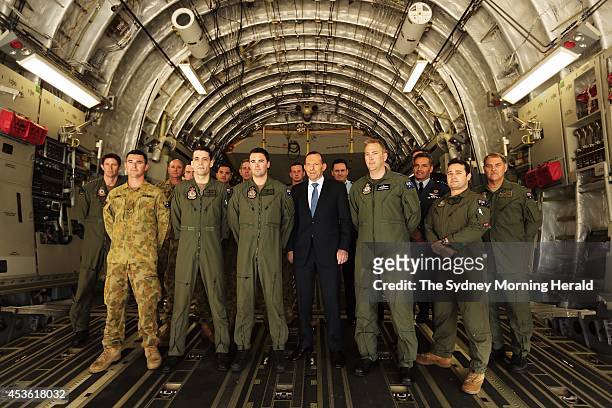 Australian Prime Minister Tony Abbott meets an Australian C17 crew at the Hilversum military airbase in the Netherlands, August 11, 2014. The crew...