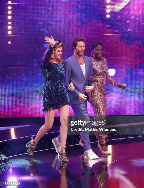 Nikeata Thompson, Howard Donald and Palina Rojinski attend the final of the tv show 'Got to Dance' on August 14, 2014 in Cologne, Germany.