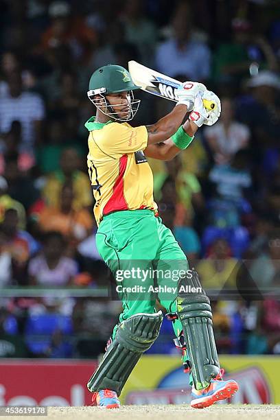 Guyana Amazon Warriors batsman Lendl Simmons plays an attacking shot during his match winning innings of 71 not out during the Semifinal match...