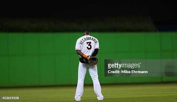 Adeiny Hechavarria of the Miami Marlins looks on during a game against the Arizona Diamondbacks at Marlins Park on August 14, 2014 in Miami, Florida.
