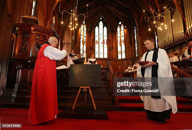 Archbishop of Canterbury, Justin Welby unveils a foundation stone during a service at St Mary's Church after a tour of the Holy Trinity Cathedral on...