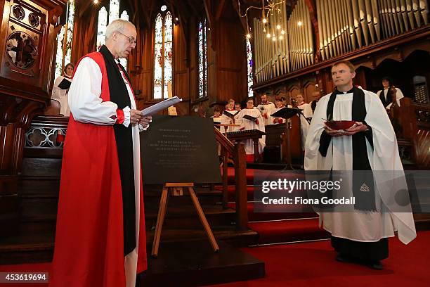 Archbishop of Canterbury, Justin Welby unveils a foundation stone during a service at St Mary's Church after a tour of the Holy Trinity Cathedral on...