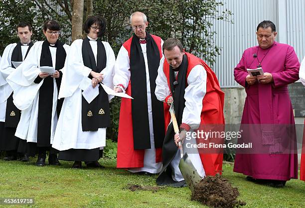 Archbishop of Canterbury, Justin Welby helps the Bishop of Auckland Ross Bay turn the first sod for the new Bishop Selwyn Chapel after a service at...