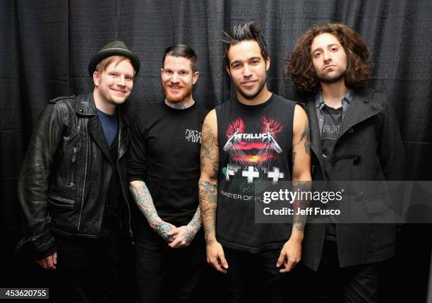 Musicians Patrick Stump, Andy Hurley, Pete Wentz and Joe Trohman of Fall Out Boy attend Q102s Jingle Ball 2013 presented by Bernie Robbins Jewelers,...