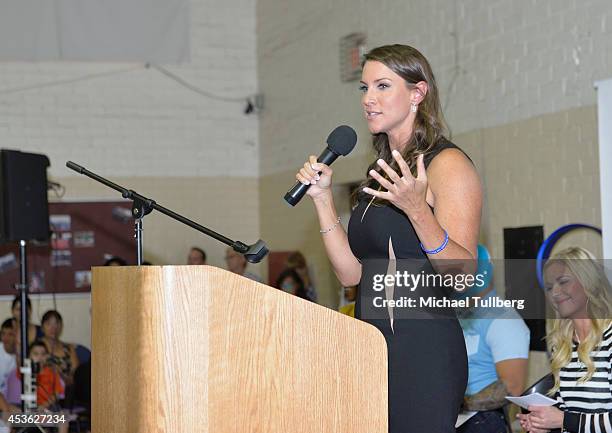 Chief Brand Officer Stephanie McMahan addresses the audience at the "Be A STAR" Anti-bullying Rally For 200 Students At Boys & Girls Club Of East Los...