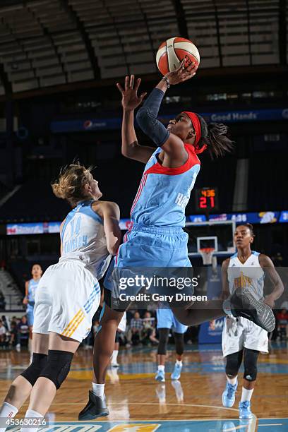 Tiffany Hayes of the Atlanta Dream shoots the ball against Allie Quigley of the Chicago Sky on August 10, 2014 at the Allstate Arena in Rosemont,...