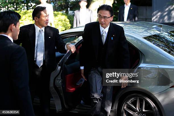 Keiji Furuya, Japan's chairman of the National Public Safety Commission, right, arrives at the Yasukuni Shrine in Tokyo, Japan, on Friday, Aug. 15,...