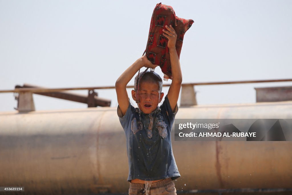 TOPSHOT-SYRIA-IRAQ-CONFLICT-UNREST-YAZIDI-REFUGEES