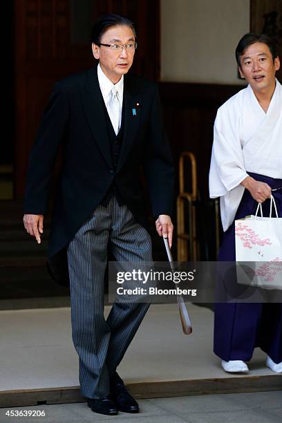 Keiji Furuya, Japan's chairman of the National Public Safety Commission, leaves the Yasukuni Shrine in Tokyo, Japan, on Friday, Aug. 15, 2014....