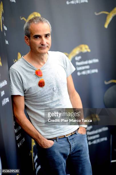 Director Olivier Assayas attends the 'Sils Maria' Photocall during the 67th Locarno Film Festival on August 15, 2014 in Locarno, Switzerland.