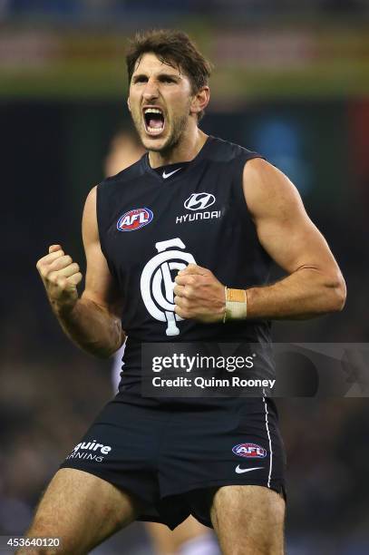 Jarrad Waite of the Blues celebrates kicking a goal during the the round 21 AFL match between the Carlton Blues and the Geelong Cats at Etihad...