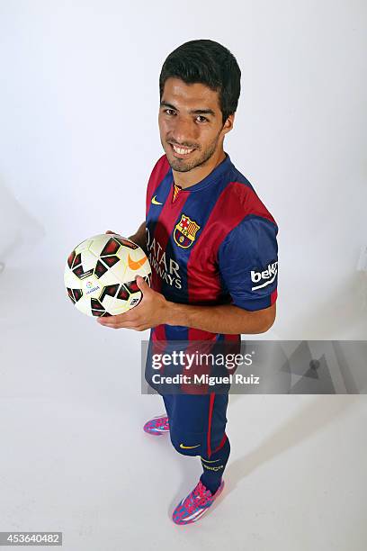 Luis Suarez of Barcelona poses during a portrait session at the Ciutat Esportiva on August 15, 2014 in Barcelona, Spain.