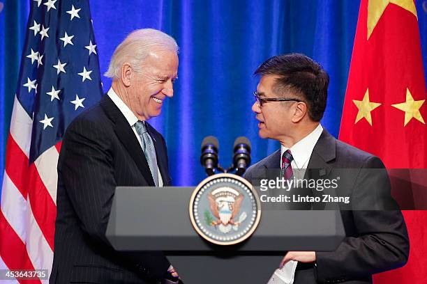 Vice President Joe Biden shake hands with U.S. Ambassador to China Gary Locke during his business leader breakfast at the The St. Regis Beijing hotel...