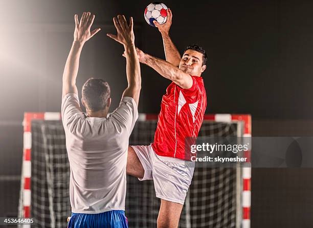 handball player in action. - court handball bildbanksfoton och bilder