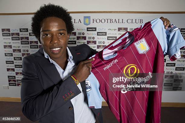 New signing Carlos Sanchez of Aston Villa poses for a picture at the club's training ground at Bodymoor Heath on August 15, 2014 in Birmingham,...