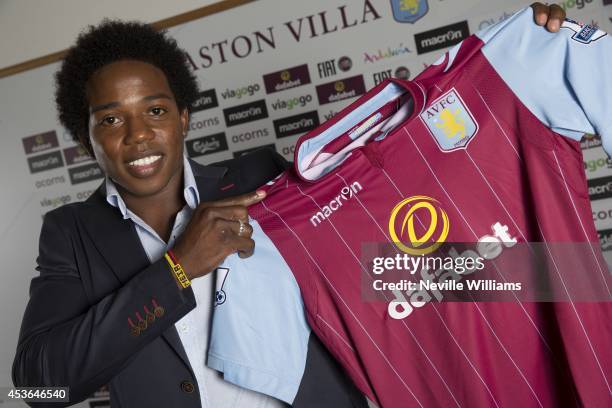 New signing Carlos Sanchez of Aston Villa poses for a picture at the club's training ground at Bodymoor Heath on August 15, 2014 in Birmingham,...