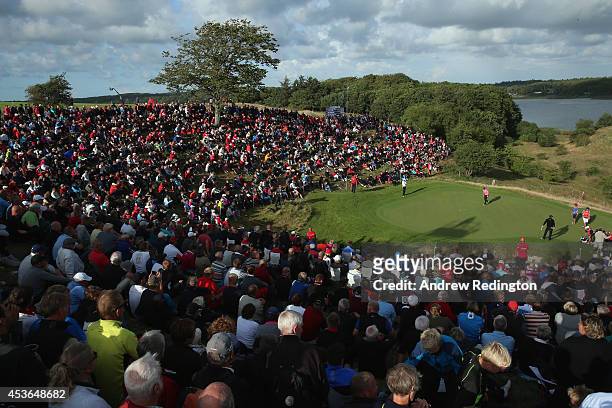 General view of the 16th hole as Thomas Bjorn of Denmark, Marc Warren of Scotland and Nicolas Colsaerts of Belgium putt during the second round of...
