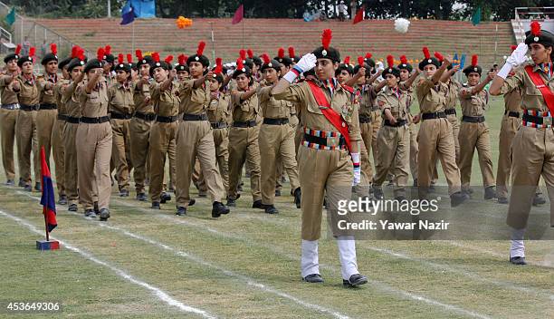Female National Cadet Corps members salute to the chief minister of Jammu and Kashmir, Omar Abdullah during India's Independence Day celebrations on...