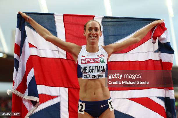 Bronze medalist Laura Weightman of Great Britain and Northern Ireland celebrates with a Union Jack after the Women's 1500 metres final during day...