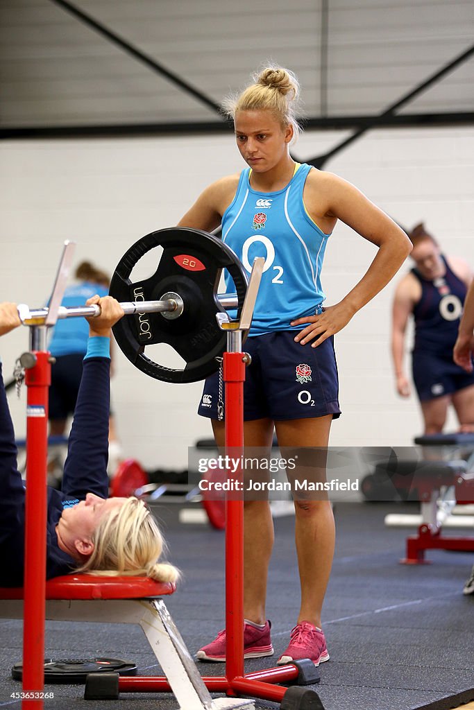 Kay Wilson Rugby Kay Wilson looks on as Ceri Large lifts weights in the gym ahead of ...
