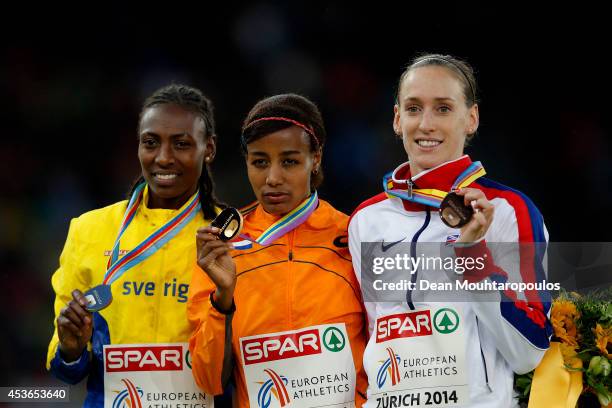 Silver medalist Adeba Aregawi of Sweden, gold medalist Sifan Hassan of the Netherlands and bronze medalist Laura Weightman of Great Britain and...